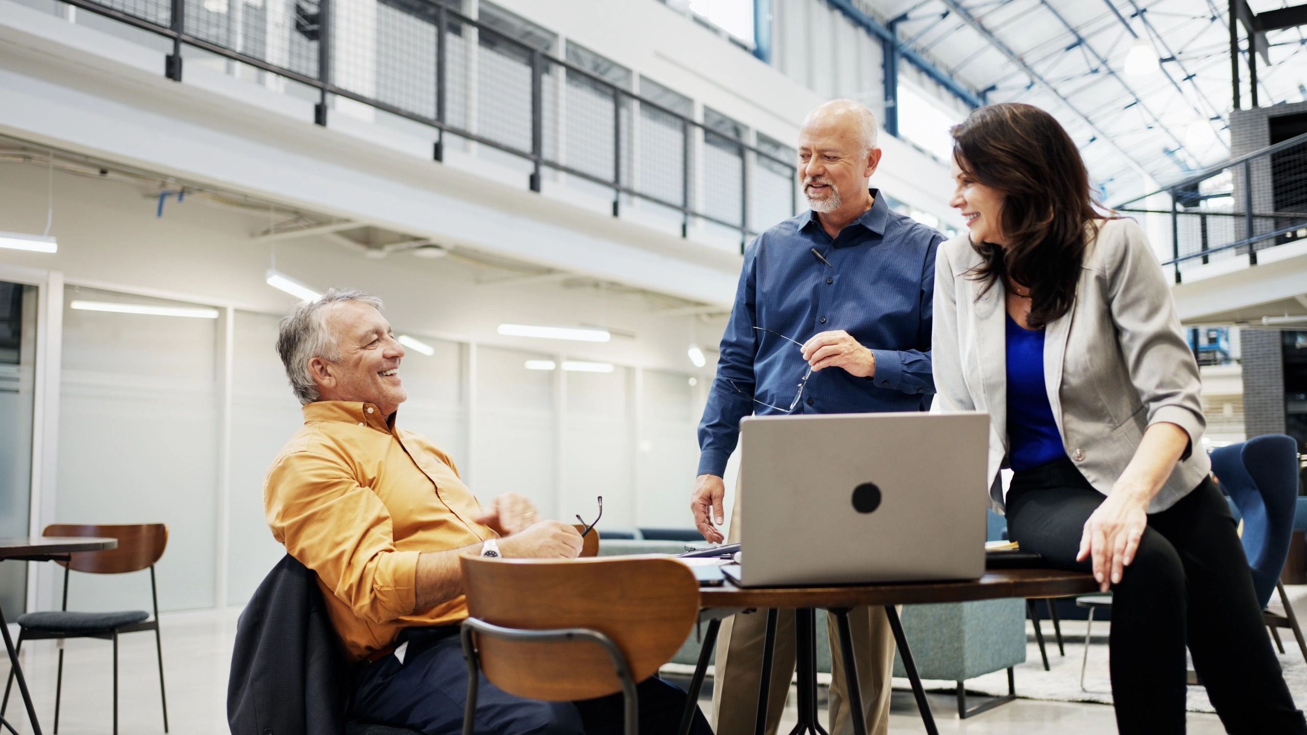 Professional agency leader collaborating with colleagues