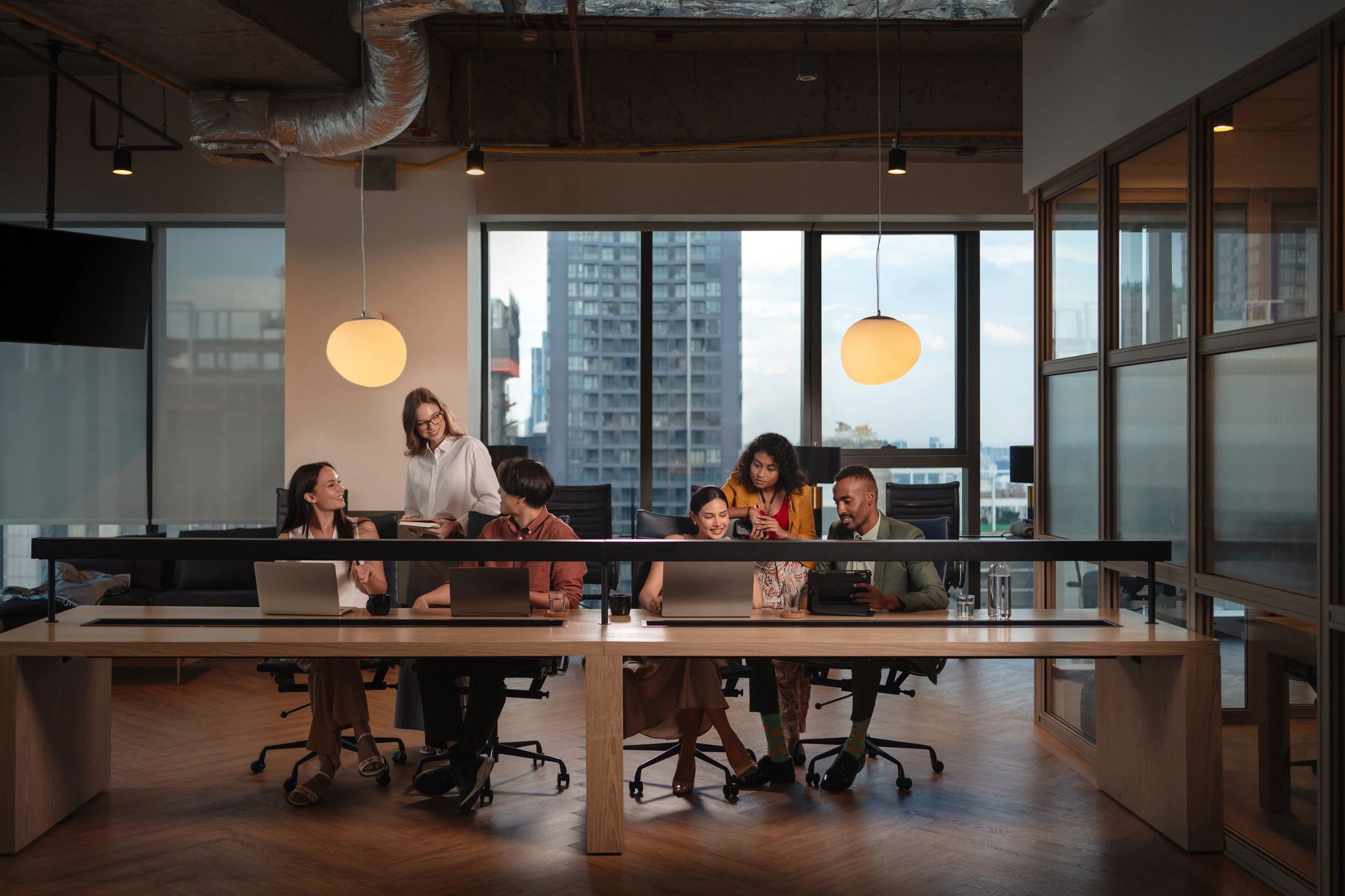 Professional consulting team collaborating in a modern office