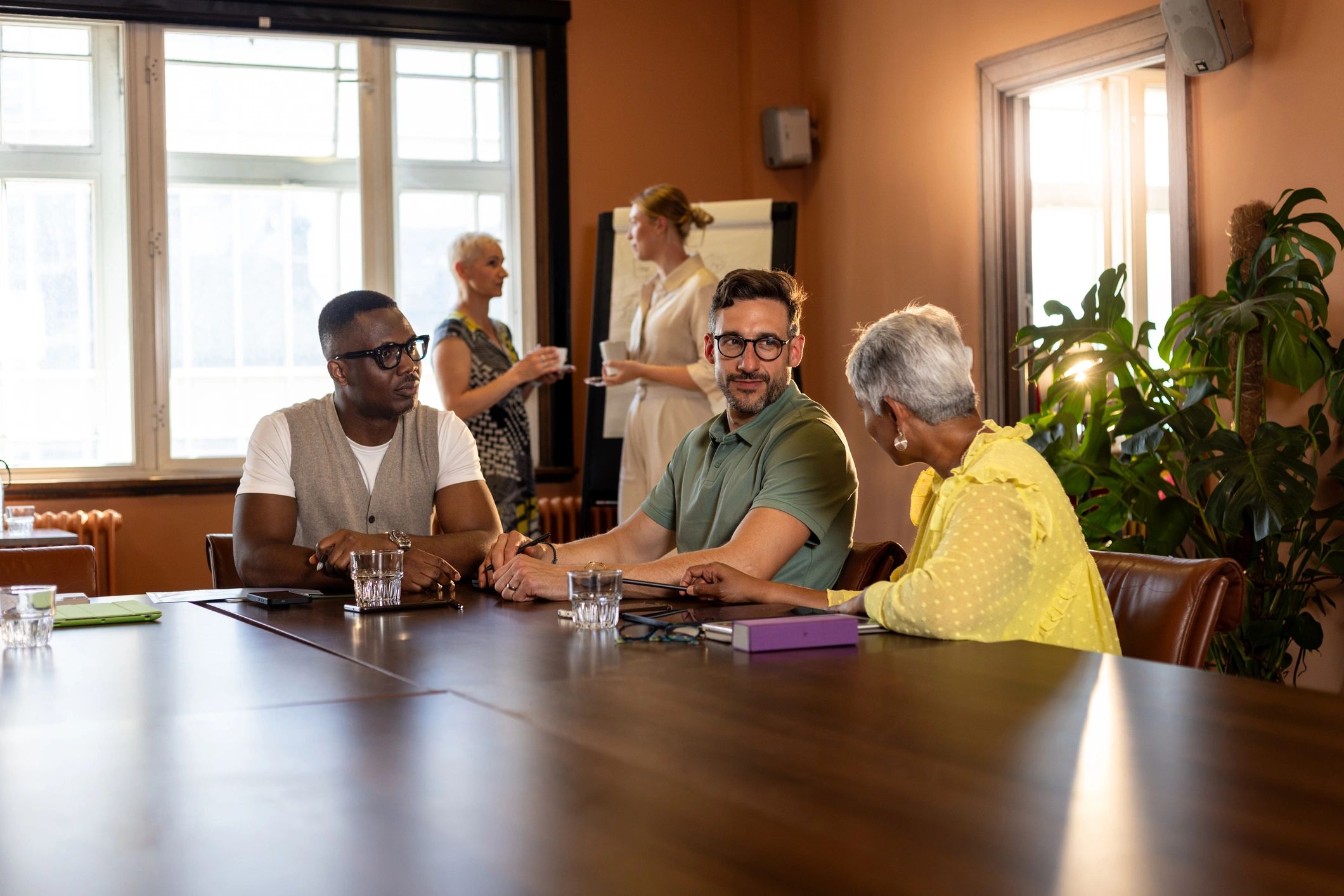 Home care consulting professionals meeting around a conference table